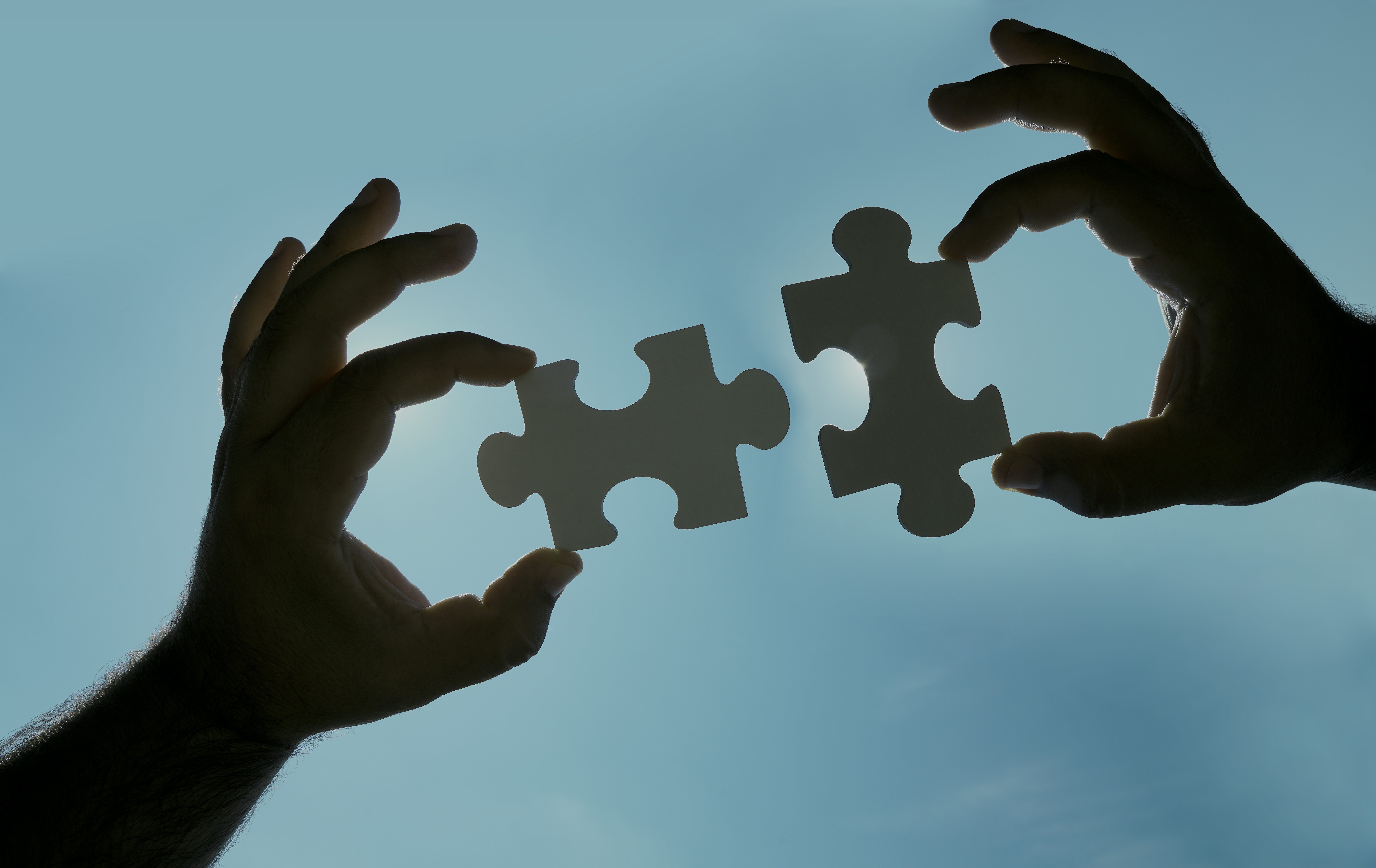 Two jigsaw piece image denoting partnership